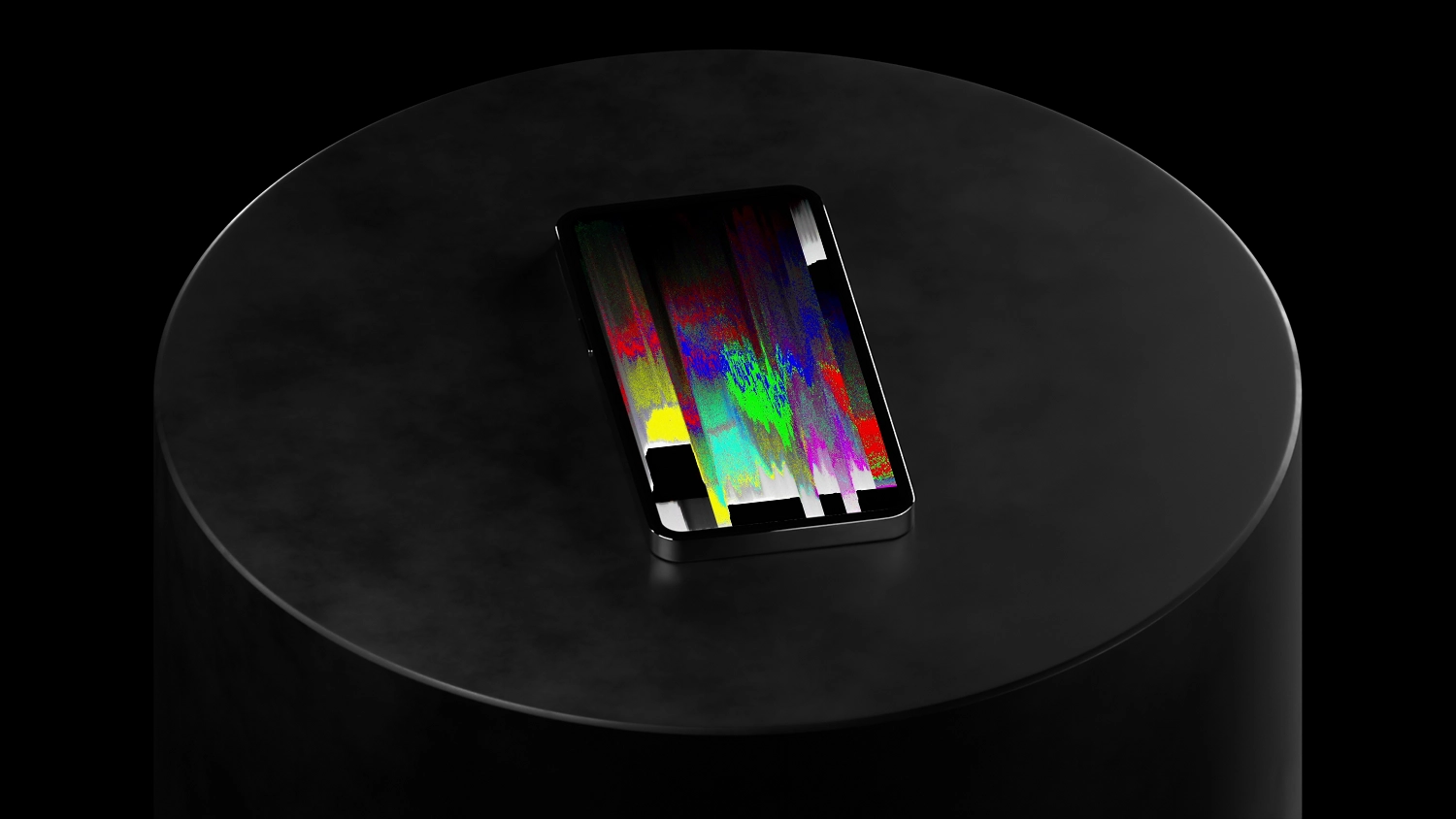 A mobile device sitting on cylindrical black plinth with a dark background